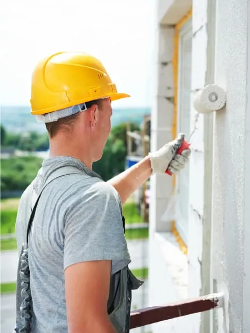 Man painting the walls